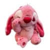 Peluche Stitch Sakura 30cm officielle Disney, rose, faisant un clin d'œil avec des fleurs de cerisier